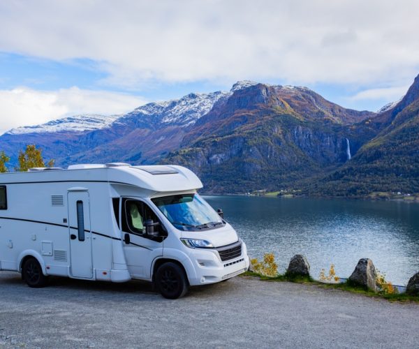 A,Motorhome,Parked,By,The,Serene,Lustrafjorden,In,Norway,,With